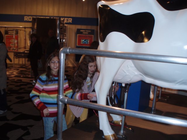 girlsmilkingthecow.jpg