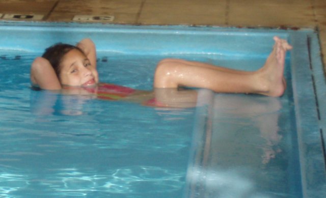 hayleerelaxinginthepool.jpg